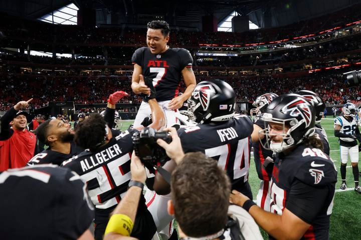 Falcons kicker Younghoe Koo and his teammates celebrate after Koo made the winning field goal in overtime against the Panthers on Sunday in Atlanta. The Falcons won 37-34.
(Miguel Martinez / miguel.martinezjimenez@ajc.com)