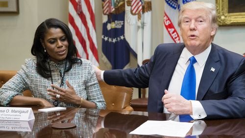 US President Donald J. Trump (R) speaks beside then Director of Communications for the Office of Public Liaison Omarosa Manigault-Newman (L) during a meeting on African American History Month in the Roosevelt Room of the White House in Washington, DC, USA, 01 February 2017.