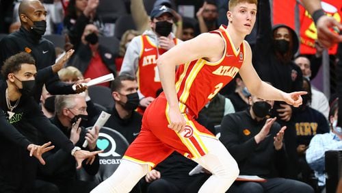 Hawks guard Kevin Huerter left Friday's win over the Wizards with a shoulder injury and is listed as a game-time decision for Monday's game in Detroit. (AJC file photo/ccompton@ajc.com)