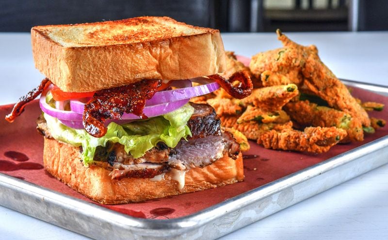 A special at the DeKalb Avenue Fox Bros. that graduated to menu status at the Westside location is the Texas Turkey (smoked turkey, lettuce, tomato, bacon, bacon, beef fat mayo, Texas toast). (Chris Hunt for The Atlanta Journal-Constitution)