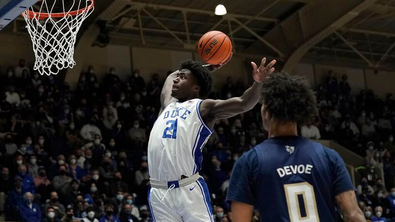 Duke forward A.J. Griffin (21) drives to the basket against Georgia Tech during the second half of an NCAA college basketball game in Durham, N.C., Tuesday, Jan. 4, 2022. (AP Photo/Gerry Broome)