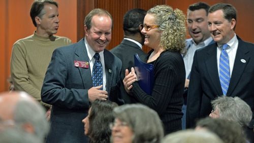 State Rep. Buzz Brockway chats with constituents. AJC file.