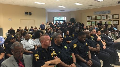 About 50 police officers and sheriff's deputies listened to DeKalb CEO Mike Thurmond's budget preview Tuesday at the Maloof Auditorium in Decatur. Thurmond said he'll address public safety pay disparities, which will result in raises for some officers. MARK NIESSE / MARK.NIESSE@AJC.COM