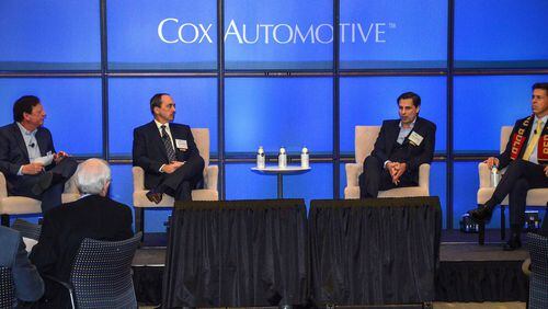 Sponsored by the Atlanta Economics Club, panel members discussed the current state of the auto industry; mobility issues; the impact of the trade wars and how technology is driving the industry. The session was held at the Jim Kennedy Center on the Cox Corporate Campus in Sandy Springs. On-stage speakers are L-R: Sandy Schwartz - Cox Automotive President and CEO, Larry Dominique - Peugeot North America President and CEO, Klaus Zellmer - Porsche USA CEO, Dietmar Exler - Mercedes-Benz USA CEO. Photos taken Monday December 10, 2018 at Cox Corporate Campus in Atlanta, Ga. (Chris Hunt/Special) for AJC Business section story 121118coxautomotive