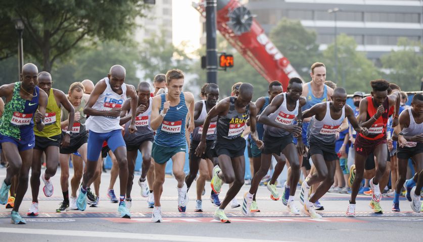 Elite men's division runners take off at the 53rd running of the Atlanta Journal-Constitution Peachtree Road Race in Atlanta on Monday, July 4, 2022. (Miguel Martinez / Miguel.MartinezJimenez@ajc.com)