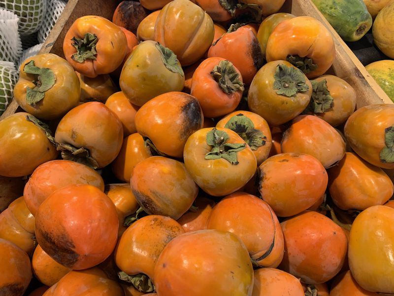 There’s a bounty of hachiya persimmons at Buford Highway Farmers Market this week.