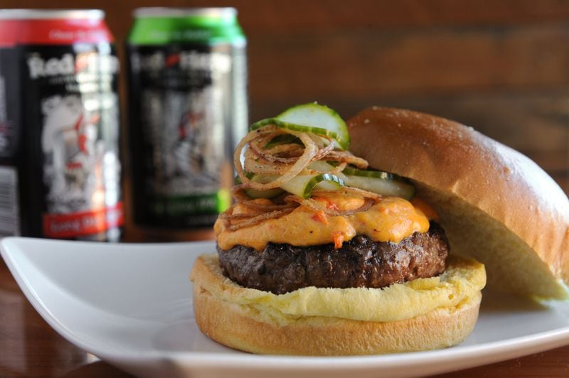 The Clayton Burger - with pimento cheese, house pickles and crispy shallots, served with Red Hare beer at Hoof & Ale. / (BECKY STEIN)