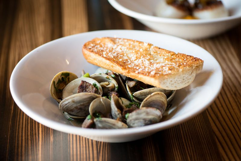  Sapelo Island clams with andouille sausage, lemongrass, white wine, and ginger broth at Local Republic. Photo credit: Mia Yakel.