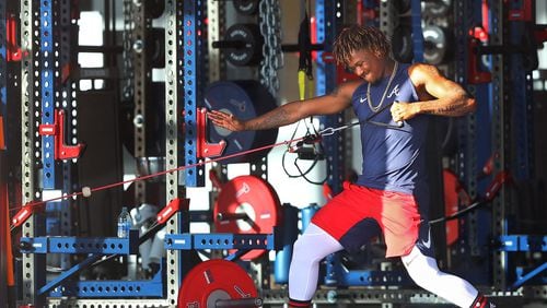 Atlanta Braves outfielder Ronald Acuna works out in the weight room before hitting the field for the first full squad workout of spring training at CoolToday Park on Tuesday, Feb. 18, 2020, in North Port.  (Curtis Compton ccompton@ajc.com)