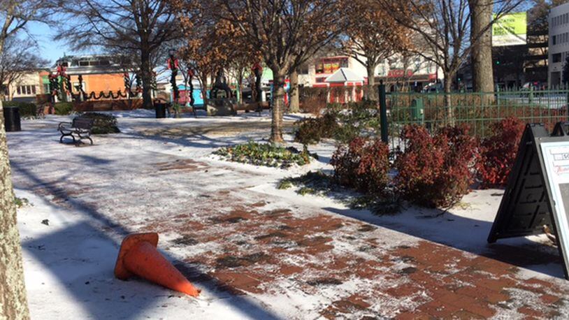 Marietta Square is quiet and icy the morning after a winter storm rolled through metro Atlanta.