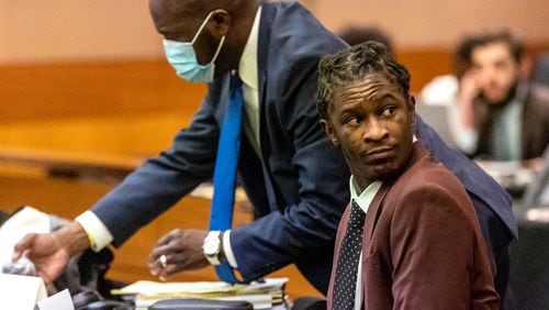 Rapper Young Thug, whose real name is Jeffery Williams, waits for the jury selection portion of the trial to continue in a Fulton County courtroom on Tuesday, Jan. 24, 2023 in Atlanta, Georgia.  (Steve Schaefer/steve.schaefer@ajc.com)