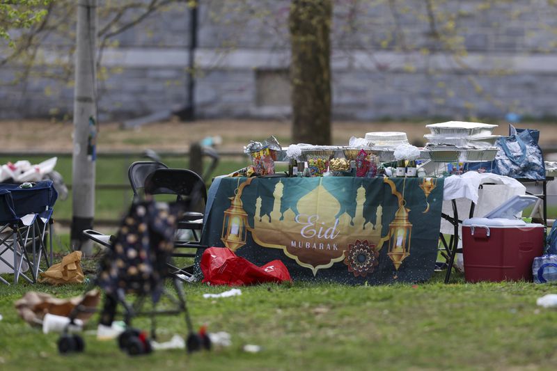 Food and belongings are left behind following a shooting at an Eid al-Fitr event, Wednesday, April 10, 2024, in Philadelphia. (Monica Herndon/The Philadelphia Inquirer via AP)