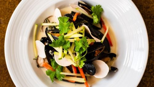 The Alden serves steamed mussels in a fragrant pool of coconut-lemongrass broth, served with mushrooms, cilantro and Thai basil. CONTRIBUTED BY HENRI HOLLIS