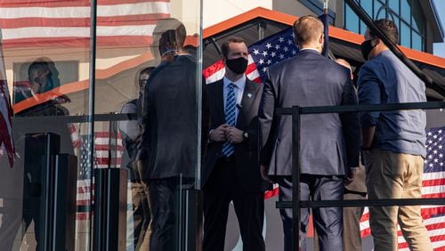More than 130 Secret Service agents who guard the White House and President Donald Trump when he travels have reportedly been ordered to isolate or quarantine because they tested positive for the coronavirus or had close contact with infected co-workers. These Secret Service agents accompanied Joe Biden in Wilmington, Delaware. (Amr Alfiky/The New York Times)