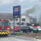 Gwinnett County firefighters extinguished a blaze at an InTown Suites that displaced about 50 people.