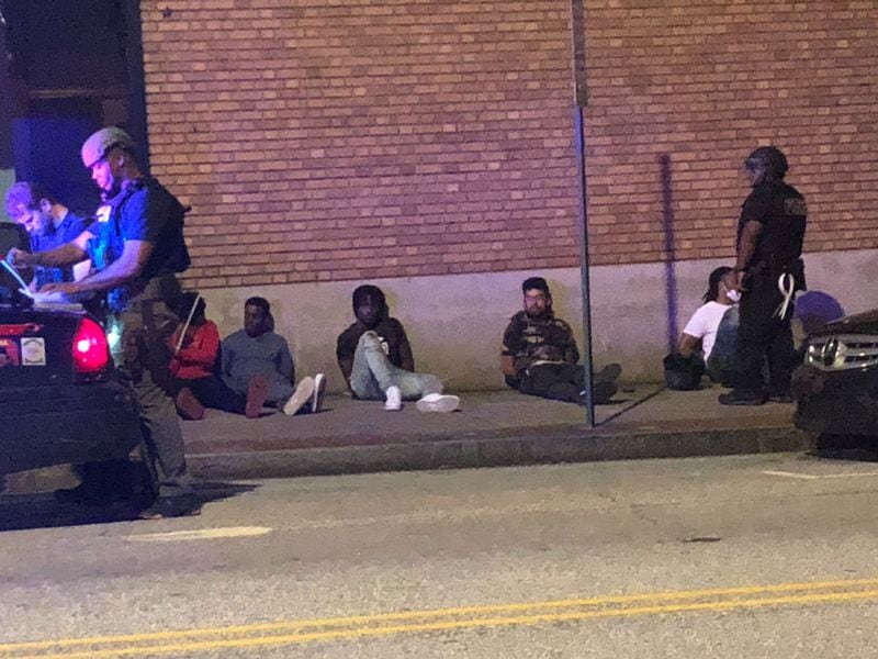 Police were detaining people out in downtown Atlanta after the city's 9 p.m. Saturday, May 30, 2020 curfew. 
