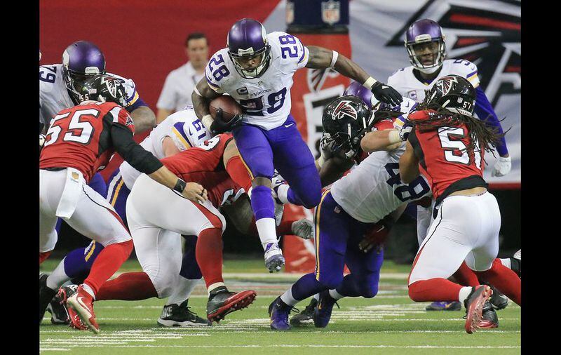 Falcons running back Tevin Coleman finds some running room against the Vikings during the first half in a football game on Sunday, Nov. 29, 2015, in Atlanta. Curtis Compton