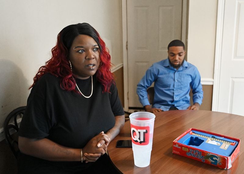Eugena Shareef, seen here with her son, Trevontae Shareef, said she did not know that his 17-year-old girlfriend, who lived with them, was wanted by authorities. But now both her son and her fiancé, Kirk Waters, have been publicly portrayed as sex traffickers. "This is a mess," she said. (Hyosub Shin / Hyosub.Shin@ajc.com)