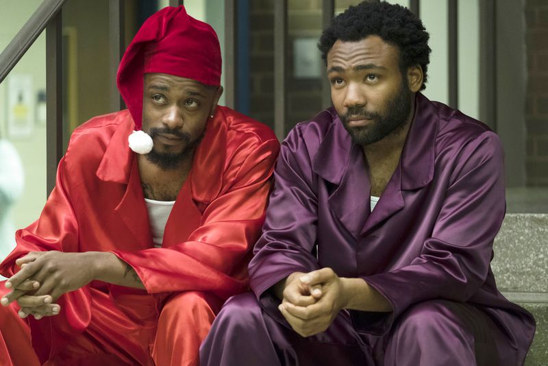 This image released by FX shows Lakeith Stanfield, left, and Donald Glover in a scene from the comedy series "Atlanta." Glover was nominated Thursday for an Emmy for outstanding lead actor in a comedy series. The 70th Emmy Awards will be held on Monday, Sept. 17. (Guy D'Alema/FX via AP)