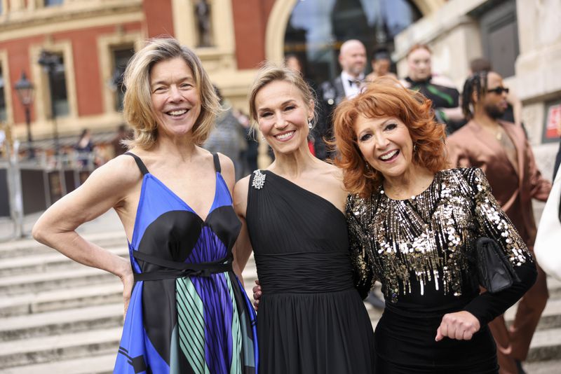 Janie Dee, from left, Joanna Riding and Bonnie Langford pose for photographers upon arrival at the Olivier Awards on Sunday, April 14, 2024, in London. (Photo by Vianney Le Caer/Invision/AP)
