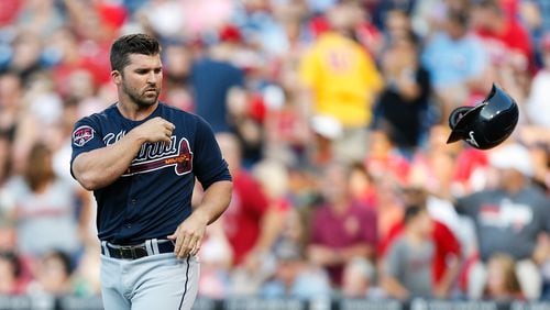 PHILADELPHIA, PA - JUNE 27: Dan Uggla #26 of the Atlanta Braves tosses his helmet after striking out in the first inning of the game against the Philadelphia Phillies at Citizens Bank Park on June 27, 2014 in Philadelphia, Pennsylvania. (Photo by Brian Garfinkel/Getty Images)