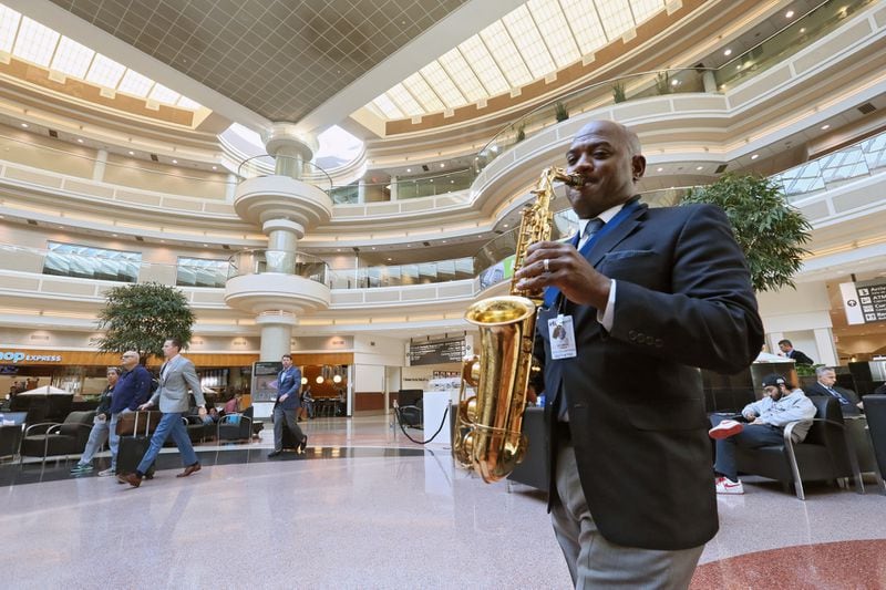 November 15, 2016 - Atlanta - Dwan Bosman performs in the Atrium. Hartsfield-Jackson uses live musicians to calm and entertain travelers in the terminal and on the concourses. BOB ANDRES /BANDRES@AJC.COM