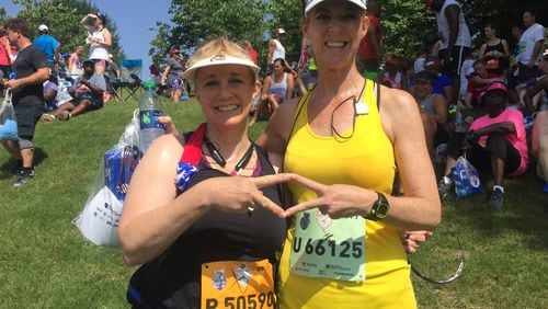 Friends and former sorority sisters Peggy Kohlmeyer and Julie Buckley finally ran the AJC Peachtree Road Race together after 32 years.