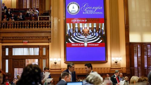 Georgia legislators gather for a long day Thursday. It was Crossover Day at the General Assembly, the 28th day of the 40-day session and a deadline when bills typically must clear at least one chamber to become law. Miguel Martinez /miguel.martinezjimenez@ajc.com