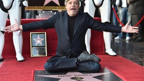 Mark Hamill exults after receiving a star on the Hollywood Walk of Fame on Thursday.