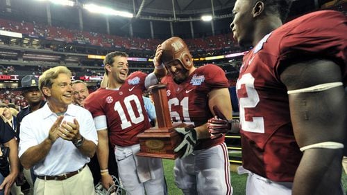 Hyosub Shin captured this image of Nick Saban celebrating with his team after its win over Virginia Tech at the Georgia Dome in 2013.