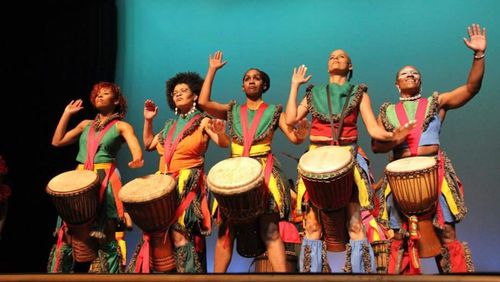 The love of what they do propels members of Giwayen Mata, shown preparing for the 20th Anniversary Concert Celebration. Now, the all-female African drum, dance and vocal ensemble is marking 25 years. CONTRIBUTED BY GIWAYEN MATA