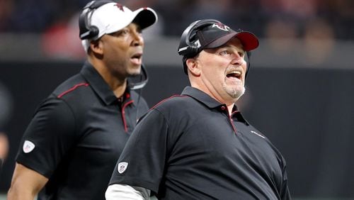 Falcons coach Dan Quinn uses body English during a field-goal attempt while playing the Washington Redskins on Thursday, August 22, 2019, in Atlanta.  Curtis Compton/ccompton@ajc.com