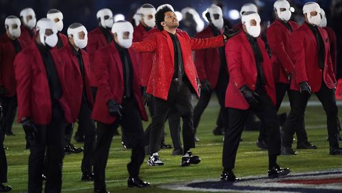 The Weeknd performs during halftime of the NFL Super Bowl 55 football game between during the halftime show of the NFL Super Bowl 55 football game between the Kansas City Chiefs and Tampa Bay Buccaneers, Sunday, Feb. 7, 2021, in Tampa, Fla. (AP Photo/Ashley Landis)