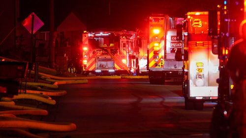 A woman was killed and three others were hurt in a house fire on Merry Oak Road in Cobb County early Wednesday morning. BEN HENDREN FOR THE AJC