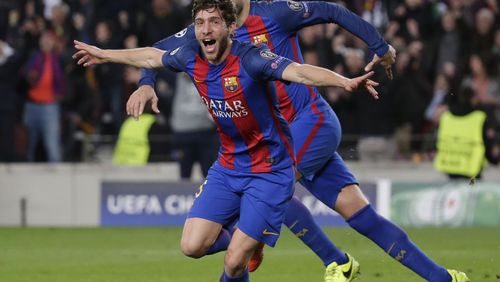 Barcelona's Sergi Roberto celebrates after scoring the sixth goal during the Champion League round of 16, second leg soccer match between FC Barcelona and Paris Saint Germain at the Camp Nou stadium in Barcelona, Spain, Wednesday March 8, 2017. Barcelona won 6-1. (AP Photo/Emilio Morenatti)