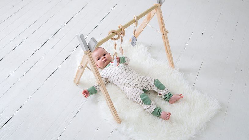 Marietta-based Clover and Birch creates modern wooden toys, including its best-selling activity gym for babies.