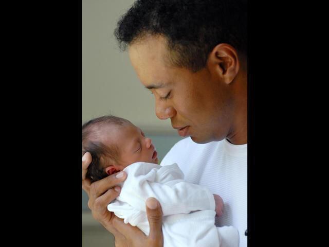 Tiger Woods with newborn daughter Sam Alexis Woods in June of 2007.