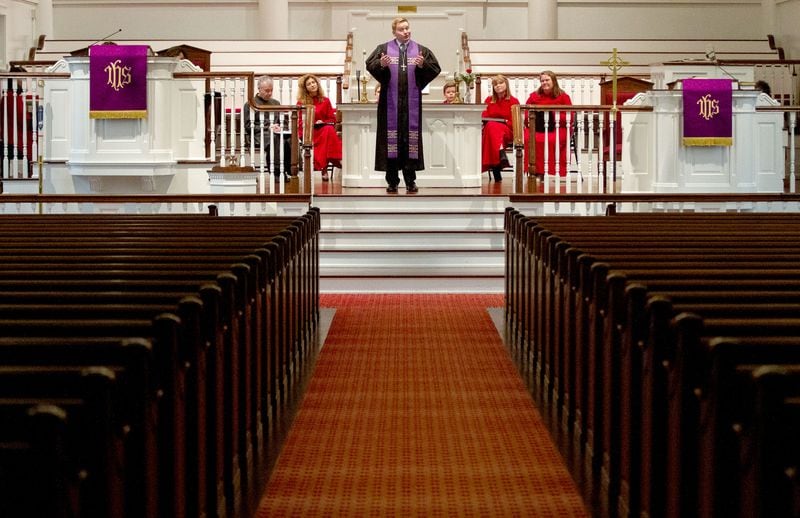 First United Methodist Church of Marietta's the Rev. Brian Smith leads a children's sermon through the livestream of the Sunday service on March 15, 2020.  (Photo: STEVE SCHAEFER / SPECIAL TO THE AJC)