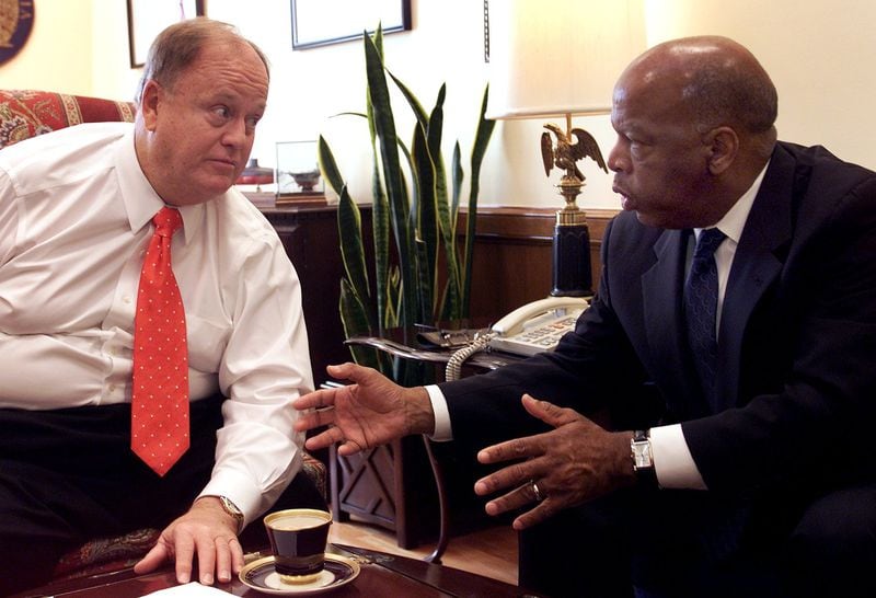 President Joe Biden on Friday signed the bills renaming the Veterans Affairs Medical Center in Decatur for the late U.S. Sen. Max Cleland (left), who is pictured with the late U.S. Rep. John Lewis. Both were Georgia Democrats. (Rick McKay/Cox Washington Bureau)