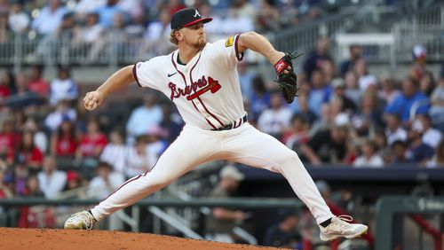 Atlanta Braves starting pitcher Spencer Schwellenbach (56) delivers to a Washington Nationals batter during the second inning at Truist Park, Wednesday, May 29, 2024, in Atlanta. Atlanta right-hander Spencer Schwellenbach makes his major league debut Wednesday night. (Jason Getz / AJC)
