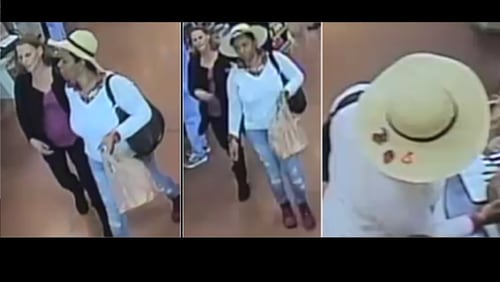 Gwinnett County police are trying to identify these two women. Police believe they stole credit cards and used them at a Kroger.