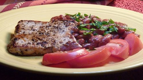 Cracked Pepper Pork with Honey Mustard Baked Beans. (Linda Gassenheimer/TNS)