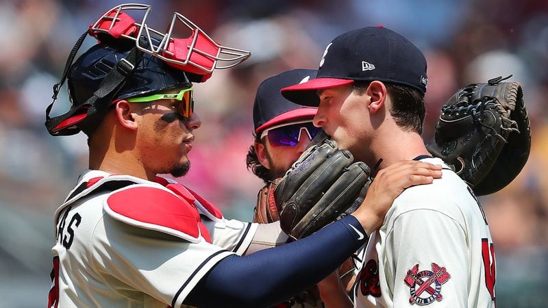 Braves starting pitcher Max Fried (right) and catcher William Contreras confer with Dansby Swanson (center) looking on during the seventh inning Sunday, May 23, 2021, against the Pittsburgh Pirates at Truist Park in Atlanta. (Curtis Compton / Curtis.Compton@ajc.com)