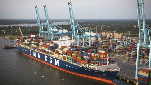 This Monday Aug. 28, 2017 image provided by the Port of Virginia shows the CMA CGM Theodore Roosevelt being unloaded at the Virginia International Gateway in Norfolk, Va. The arrival of the ship breaks the record for largest container ship ever to visit the Port of Virginia and the East Coast. (Keith Lanpher/Port of Virginia via AP)