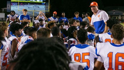 Parkview head coach Eric Godfree talks to the team after a 31-24 win over Norcross Friday, Oct. 4, 2019, in Norcross.