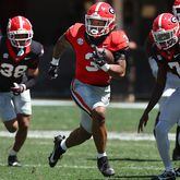 Georgia running back Andrew Paul breaks away for yardage during the G-Day game on Saturday, April 13, 2024.  (Curtis Compton for the Atlanta Journal Constitution)