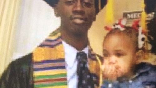 Deaundre Phillips, 24, pictured with his daughter, was shot dead on Thursday, Jan. 26, 2017, outside an Atlanta Public Safety Annex. (Family photo)
