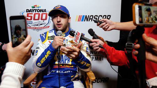 A bouquet of microphones greets Chase Elliott during a media gathering this week at Daytona.