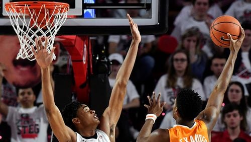Kyle Alexander of Tennessee tries to shoot over Nicolas Claxton of Georgia during the basketball game at Stegeman Coliseum on February 17, 2018 in Athens, Georgia. (Photo by Mike Comer/Getty Images)