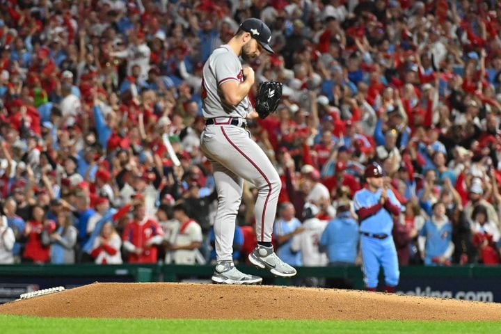 Atlanta Braves starting pitcher Spencer Strider brushes off the pitching mound after giving up a solo home run to Philadelphia Phillies’ Trea Turner during the fifth inning of NLDS Game 4 at Citizens Bank Park in Philadelphia on Thursday, Oct. 12, 2023.   (Hyosub Shin / Hyosub.Shin@ajc.com)